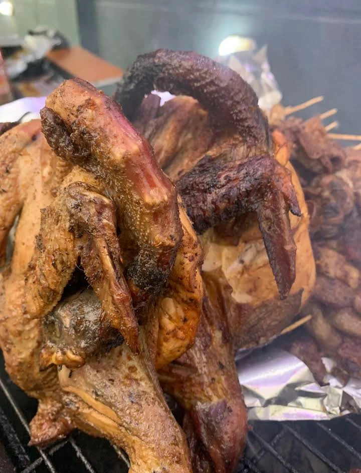 Chicken grilling over the fire