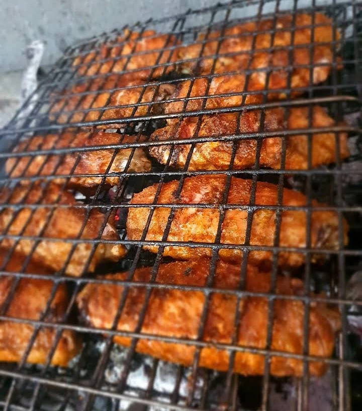 Meat grilling on the grate